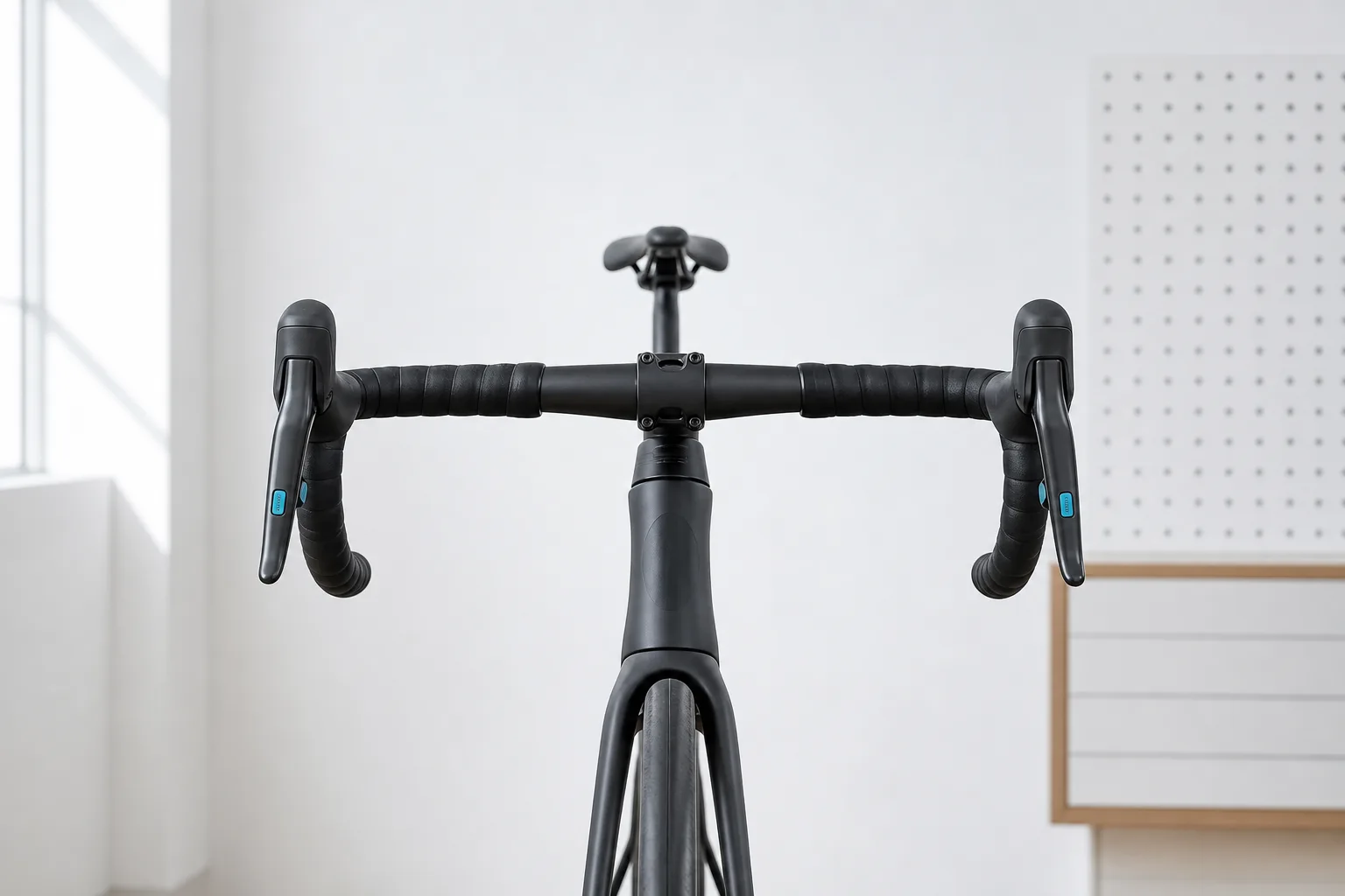Mirrored road-bike brake levers marked from matching reference points.